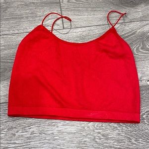 A bright red cropped top